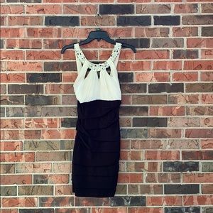 Slimming white and black cocktail dress